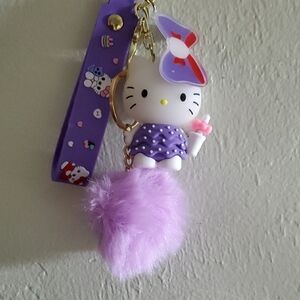 Hello Kitty Purple Polka Dot Keychain with Fluffy Pom Pom